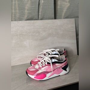 Pink Women’s Pumas.